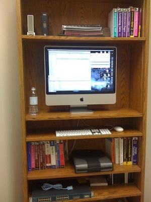 iMac in a bookshelf